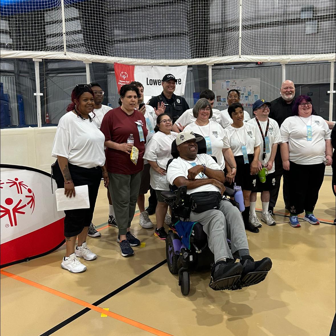 LSE Special Olympics team posing with thier 5th place ribbon.